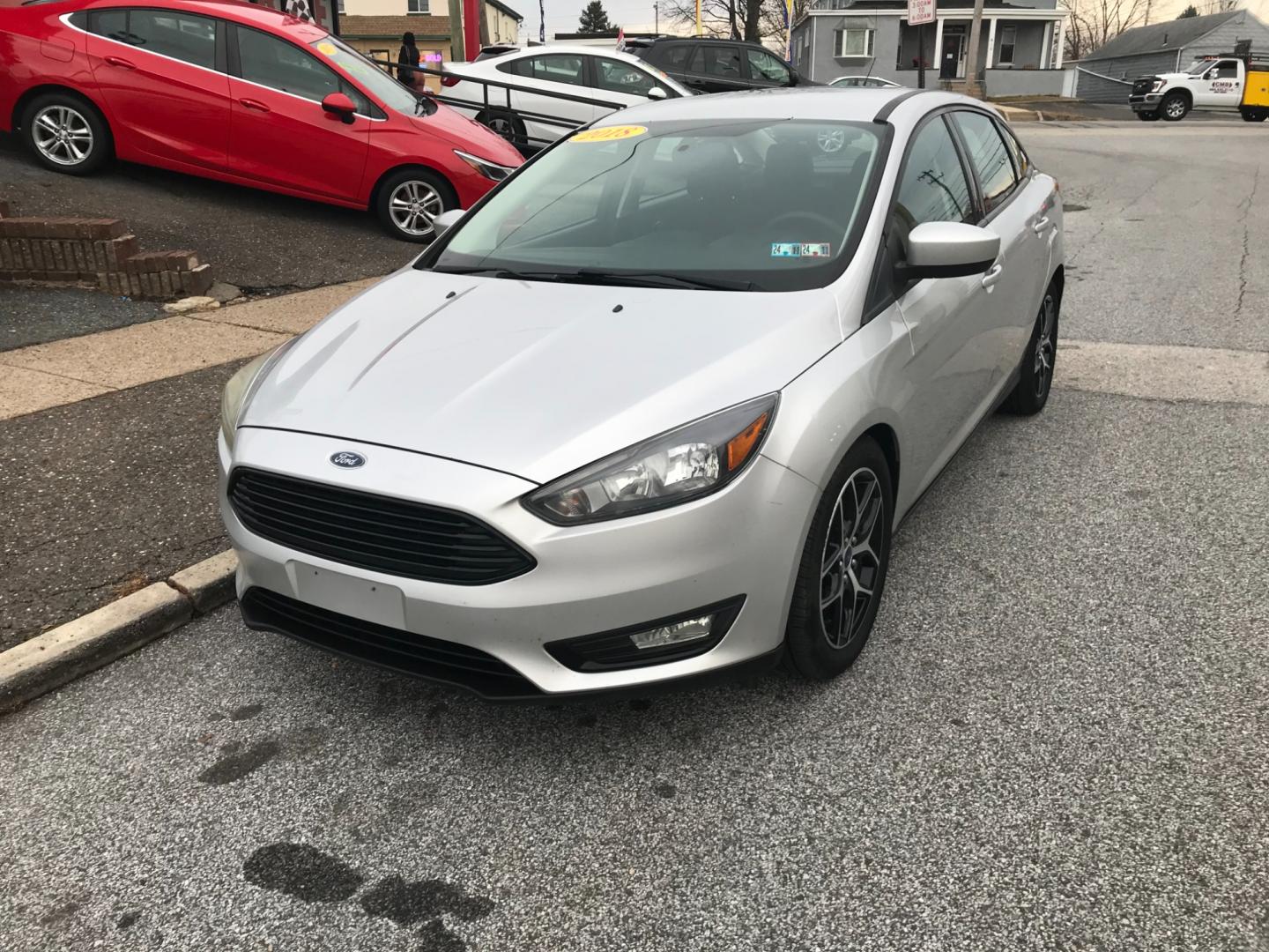 2018 Silver /Gray Ford Focus SE (1FADP3F24JL) with an 2.0 V4 engine, Automatic transmission, located at 577 Chester Pike, Prospect Park, PA, 19076, (610) 237-1015, 39.886154, -75.302338 - Photo#2